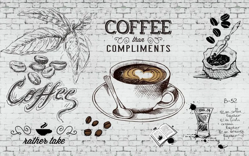 Beyaz tuğla duvar üzerinde "Coffee Than Compliments" yazılı, kahve fincanı ve çekirdekleri illüstrasyonlu duvar kağıdı.