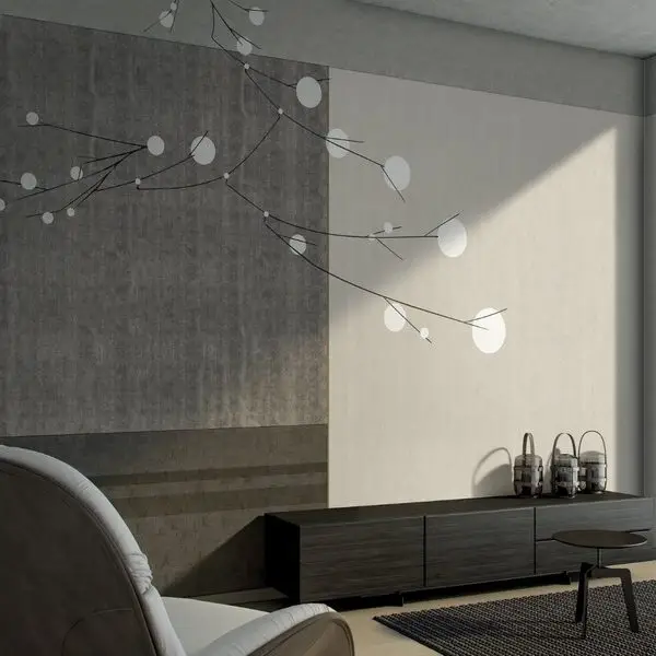 Antrasit Beton ve Bej Geçişli Zemin Üzerinde Minimalist Siyah Dallardan Sarkan Işık Küreleri Modern Duvar Kağıdı